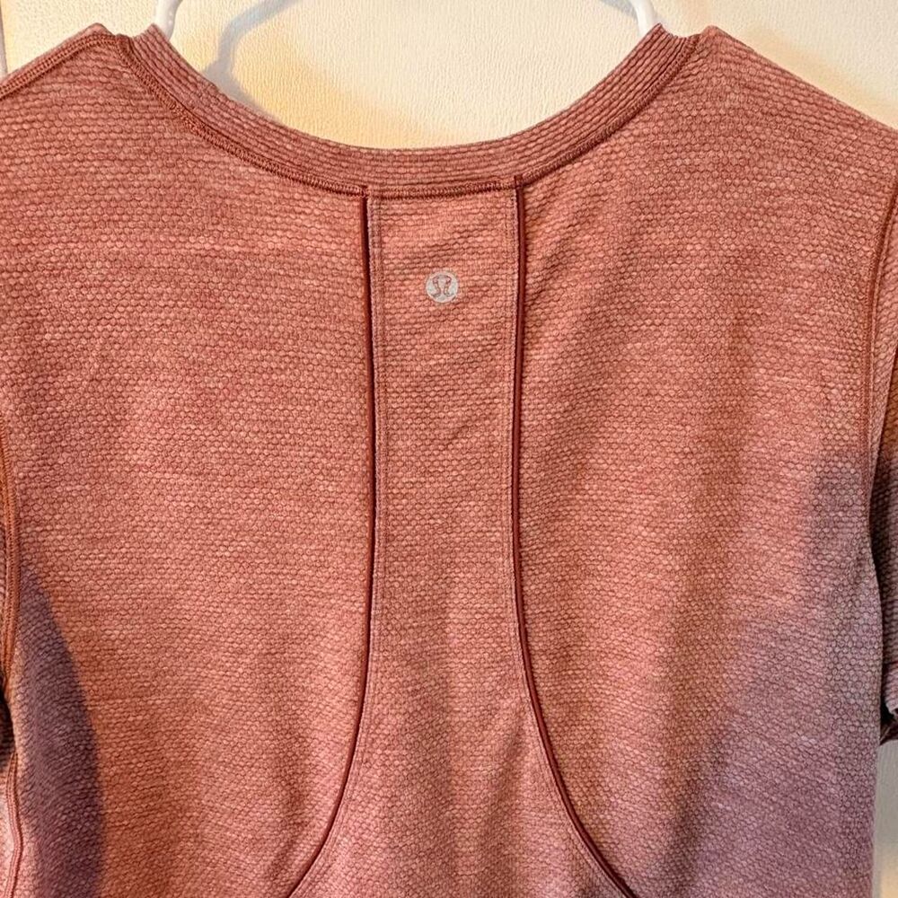 Lululemon athletic light pink/rust red workout shirt